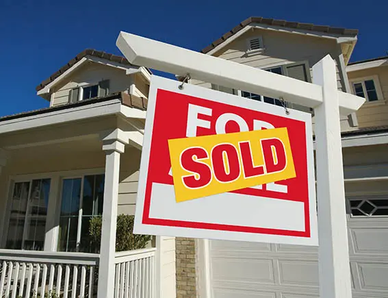 Sold Home For Sale Real Estate Sign and House Sold Home For Sale Real Estate Sign and House
