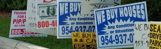 companies that buy houses bandit signs