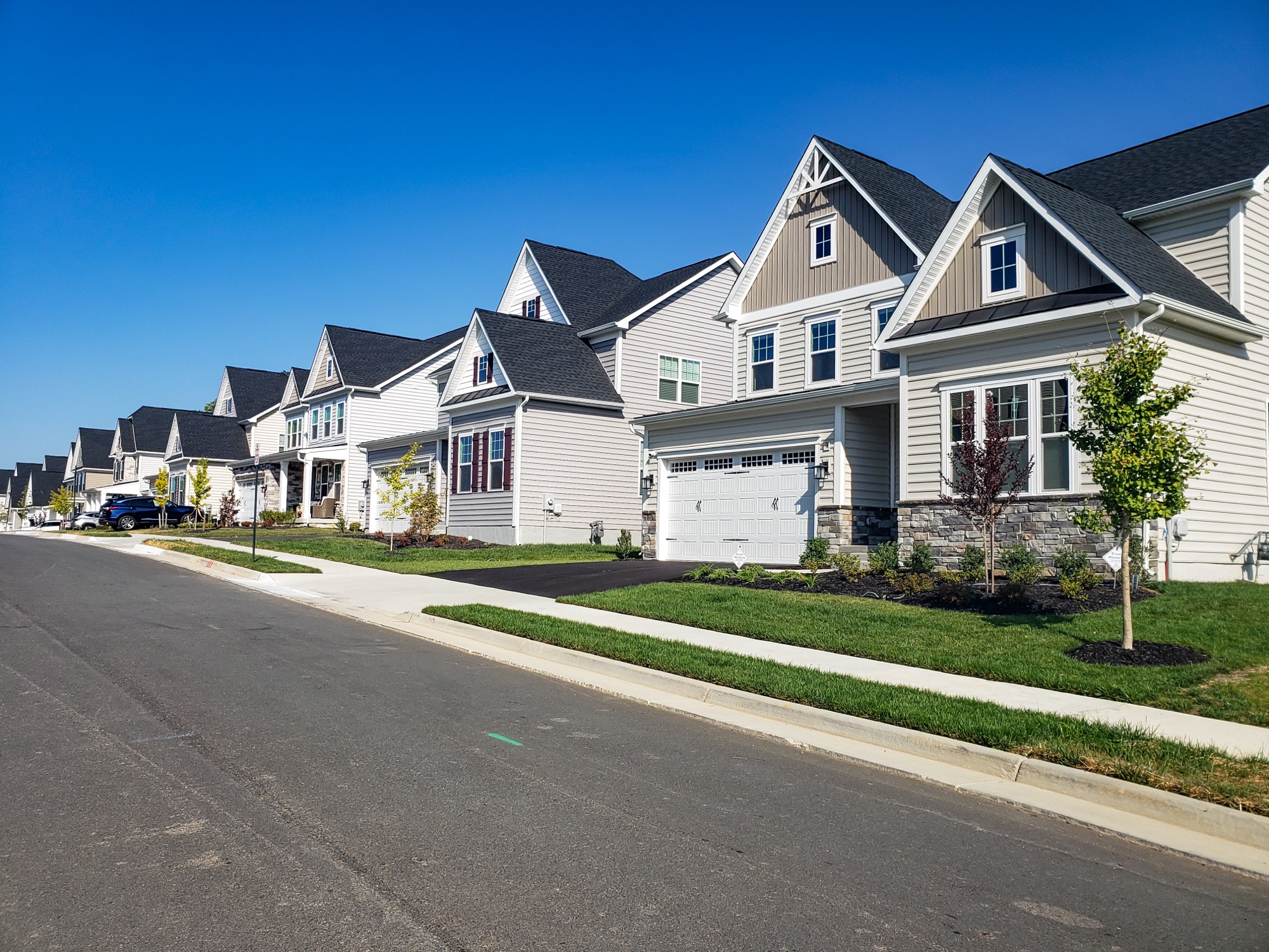 Street of newer single-family homes in Loudoun County, Virginia Street of newer single-family homes in Loudoun County, Virginia